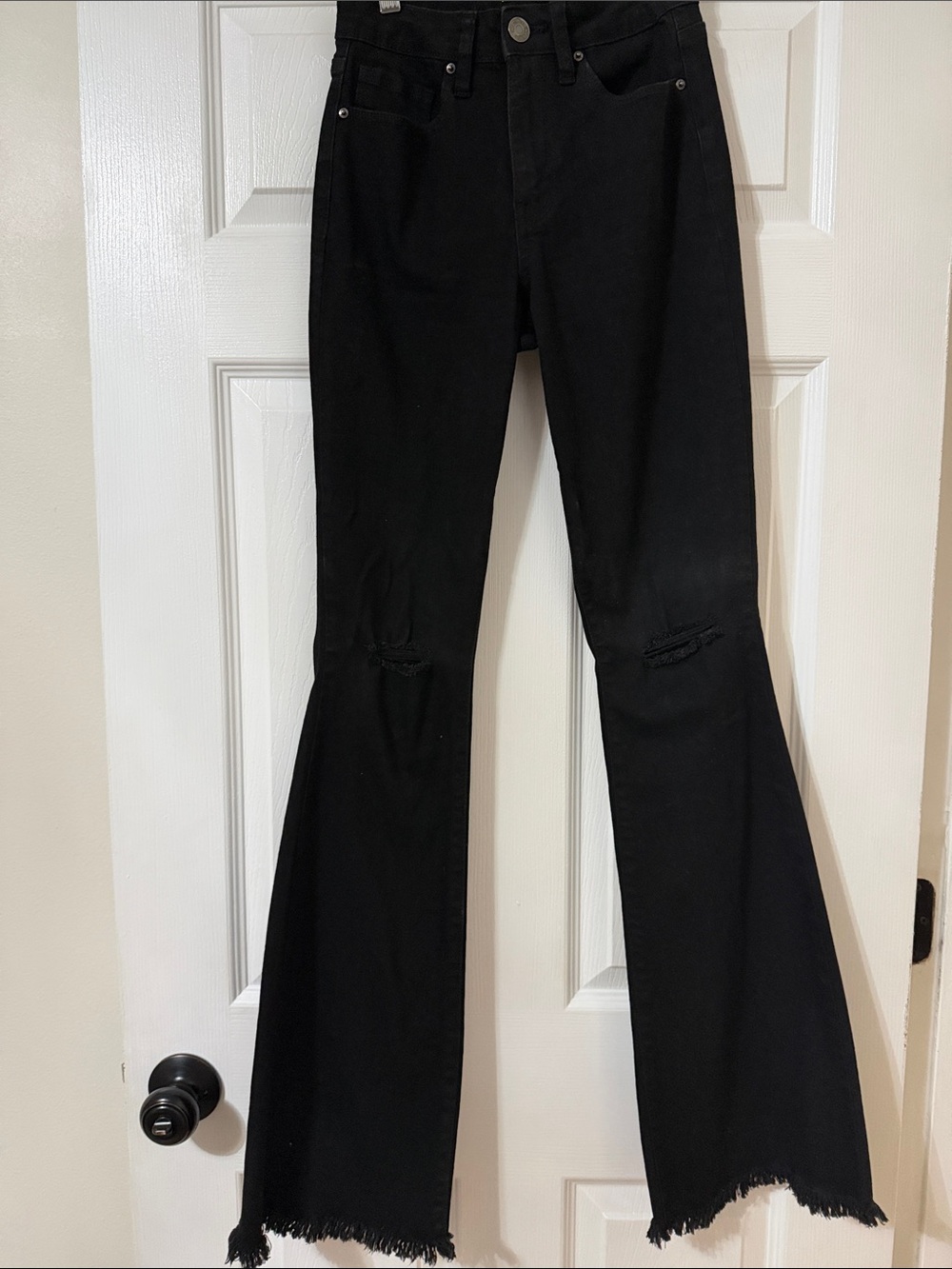 Black Flare Jeans with Distressed Knees and Frayed Hem